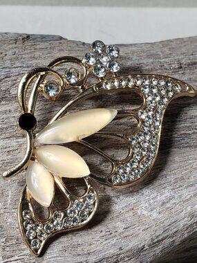 Thermoset Style Butterfly Brooch with Clear and Black Rhinestones Glows In UV